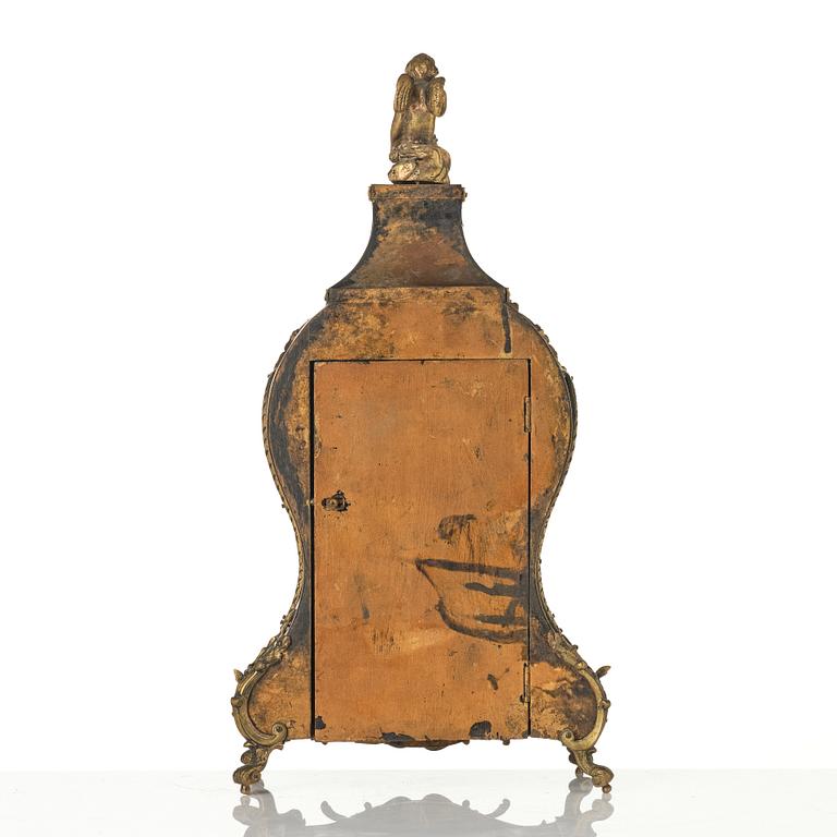 A Rococo-style mantle clock, around 1900.