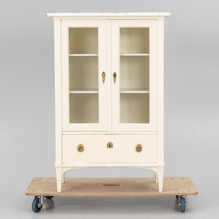 A display cabinet, early 20th century.