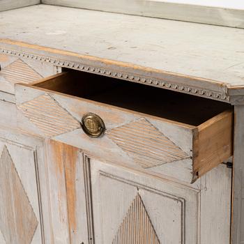 A late Gustavian grey lacquered pine cabinet, Sweden ca 1800.