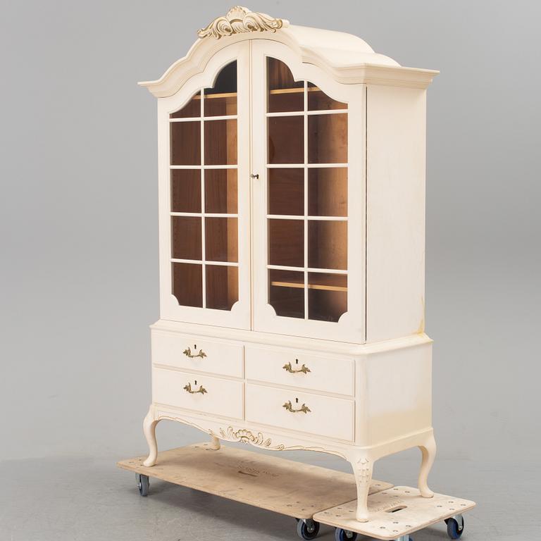 A mid 1900s cabinet by Oscar Edv Ekelunds Snickerifabriks AB, Virserum.