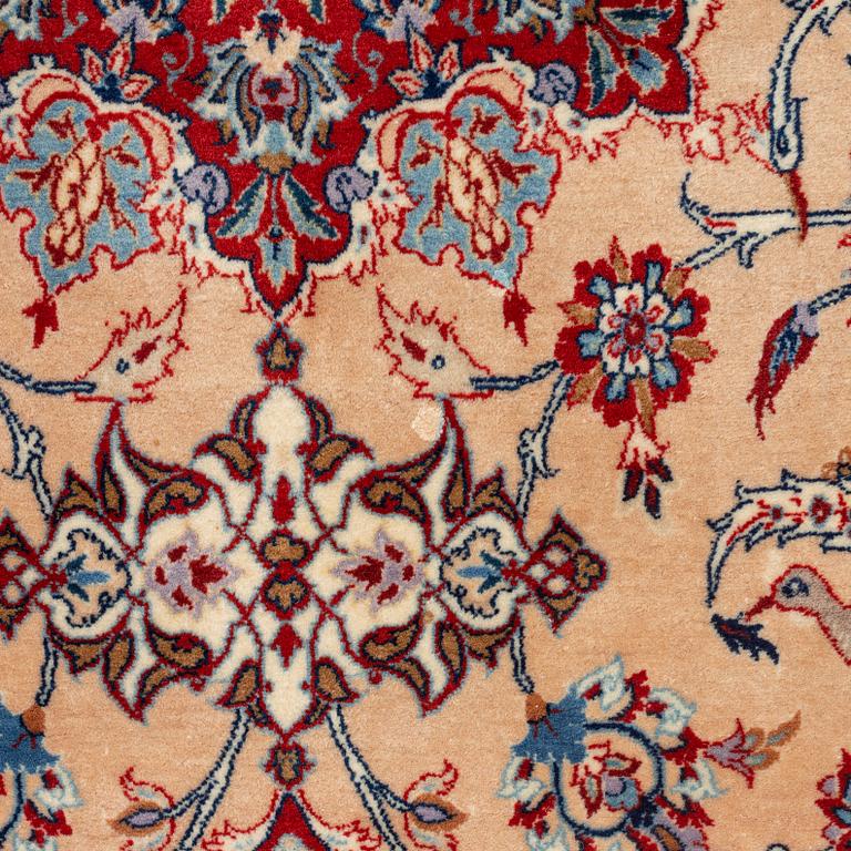 A Seirafian Esfahan rug, signed (Ahmad) Seirafian, ca 178 x 110 cm (as well as one end with 3 cm flat weave).