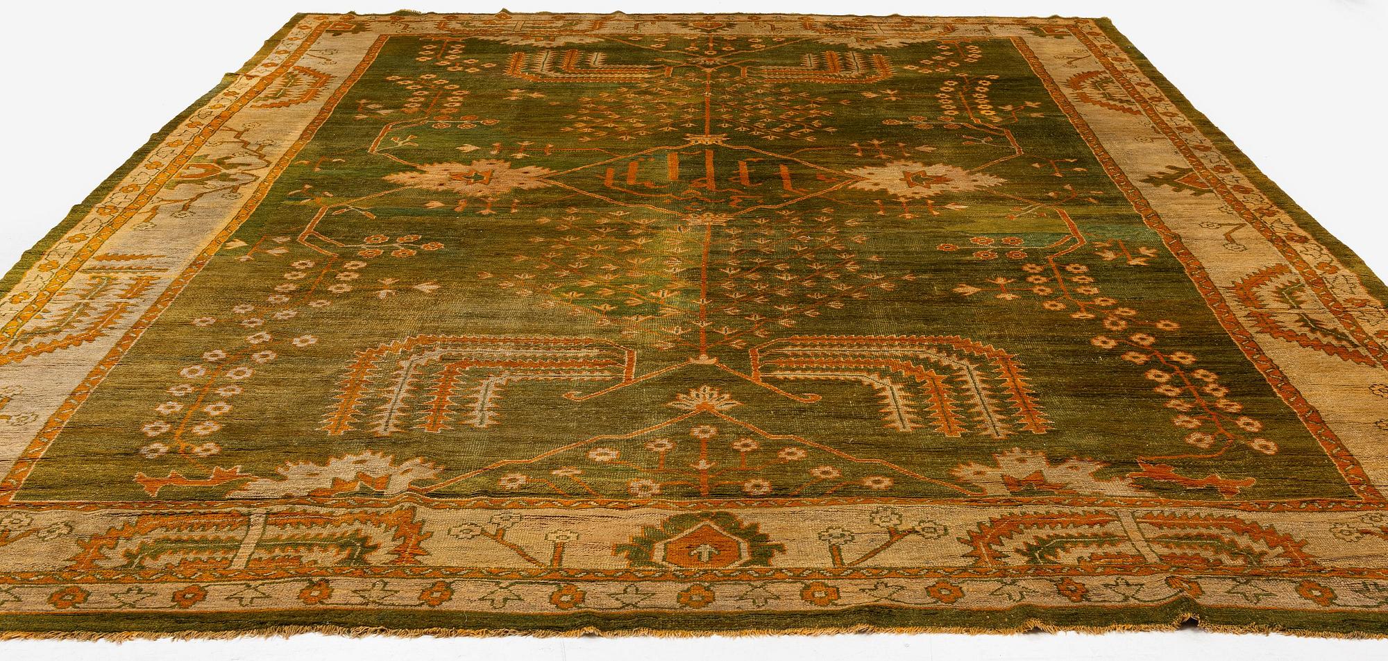 An antique Ushak carpet, Western Anatolia, c. 502 x 359 cm.
