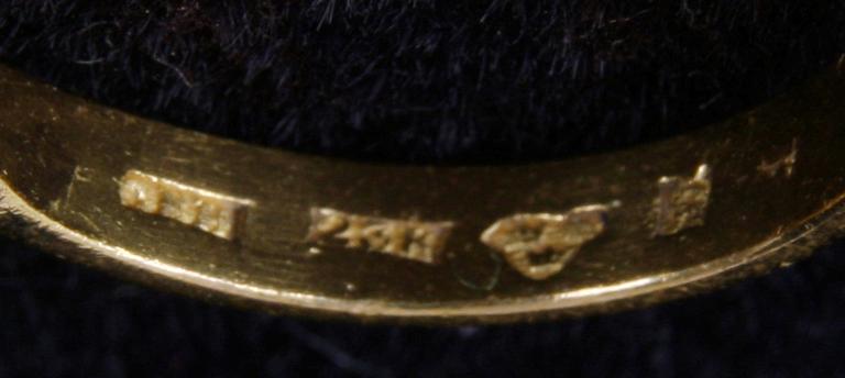 RING, 23K guld med briljant ca 0,25ct.