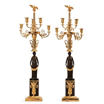 A pair of Empire early 19th century six-light candelabra.