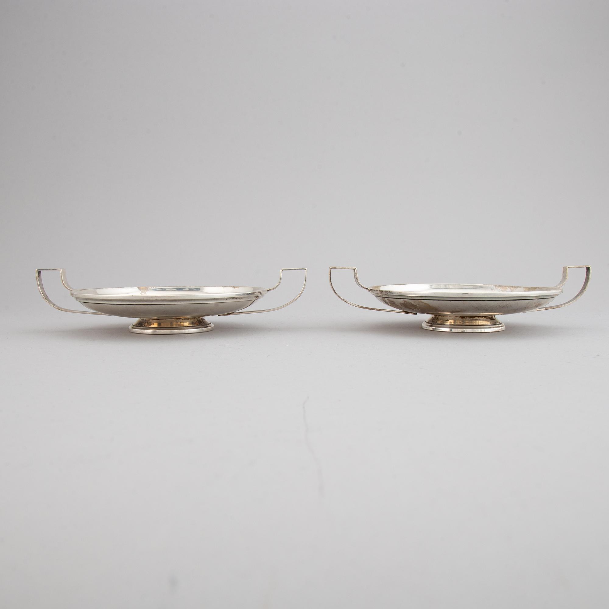 A pair of sterling silver tazzaz.