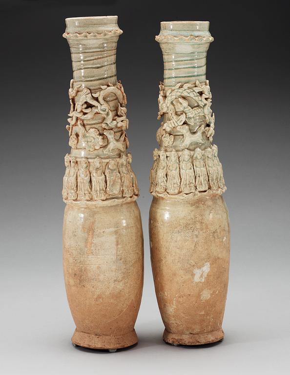 A set of two green glazed vases with covers, Yuan dynasty (1271-1368).