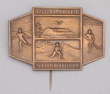 PLAKETT, brons, "Ispalatset Stockholm", CG Hallberg 18/2 1934.