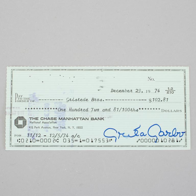 GRETA GARBO (1905-1990), egenhändigt signerad check, daterad Dec 29, 1974.