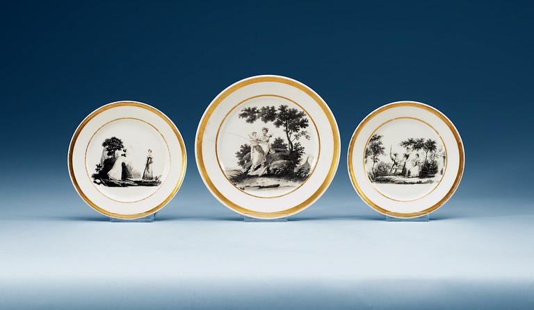 A set of 12 French small dishes and a plate, Empire.