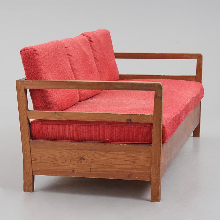 Axel Einar Hjorth, a stained pine sofa 'Sport', Nordiska Kompaniet Sweden, late 1930s.