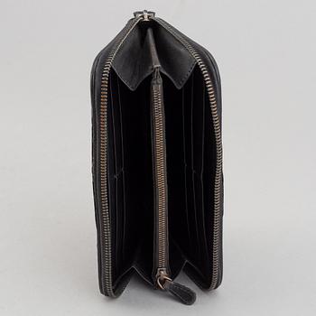 Bottega Veneta, a wallet and bracelet.