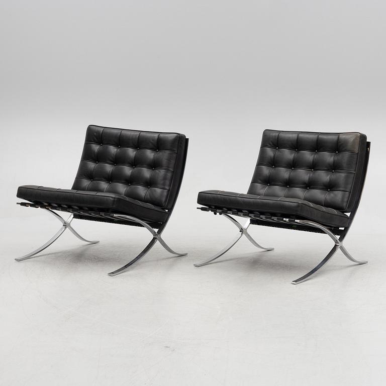 Ludwig Mies van der Rohe, a pair of "Barcelona" lounge chairs, Knoll.