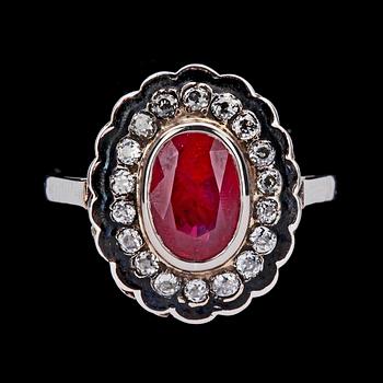 1161. RING, ovalt fasettslipad rubin samt antikslipade diamanter, tot. ca 0.35 ct.