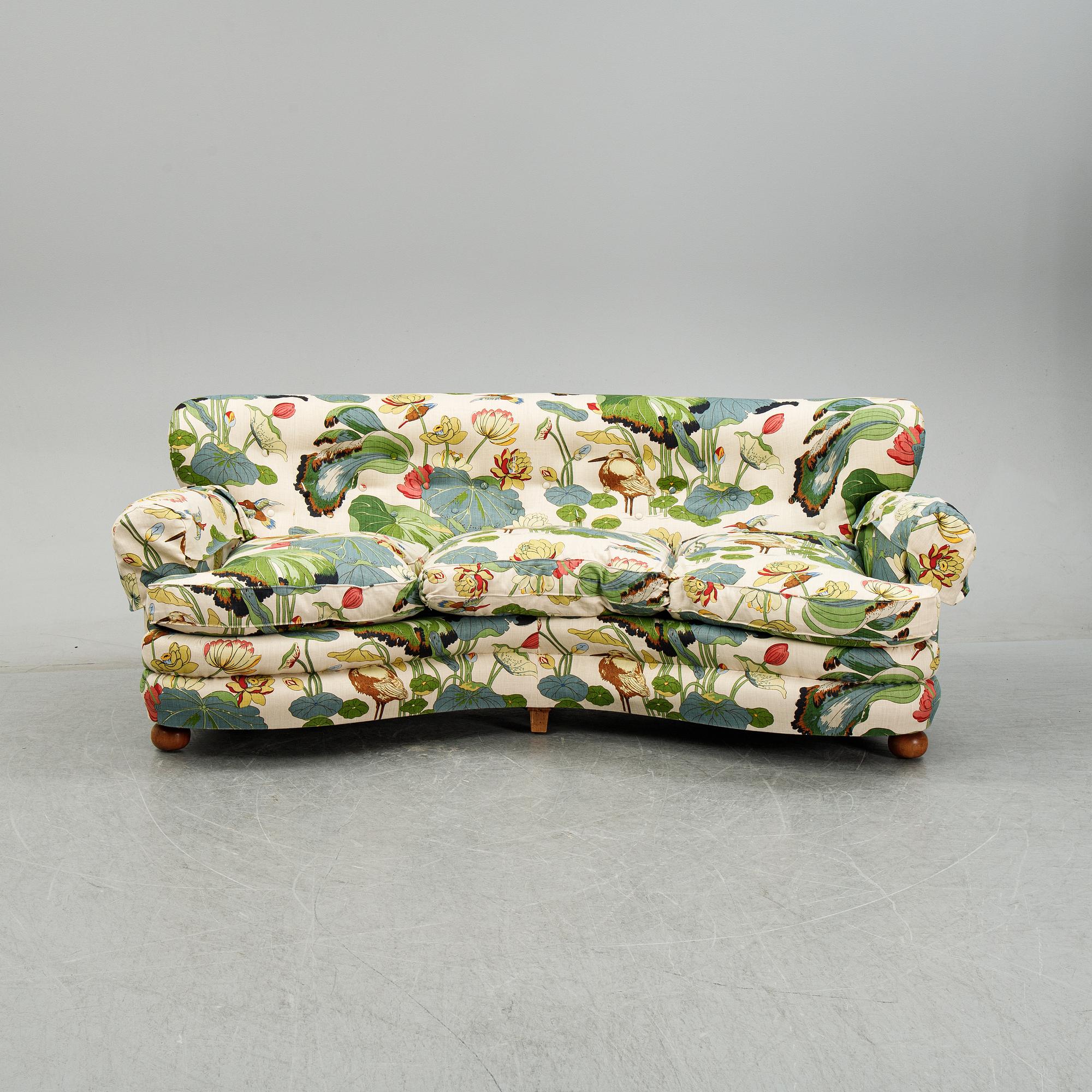 A model 968 sofa by Josef Frank for Firma Svenskt Tenn.