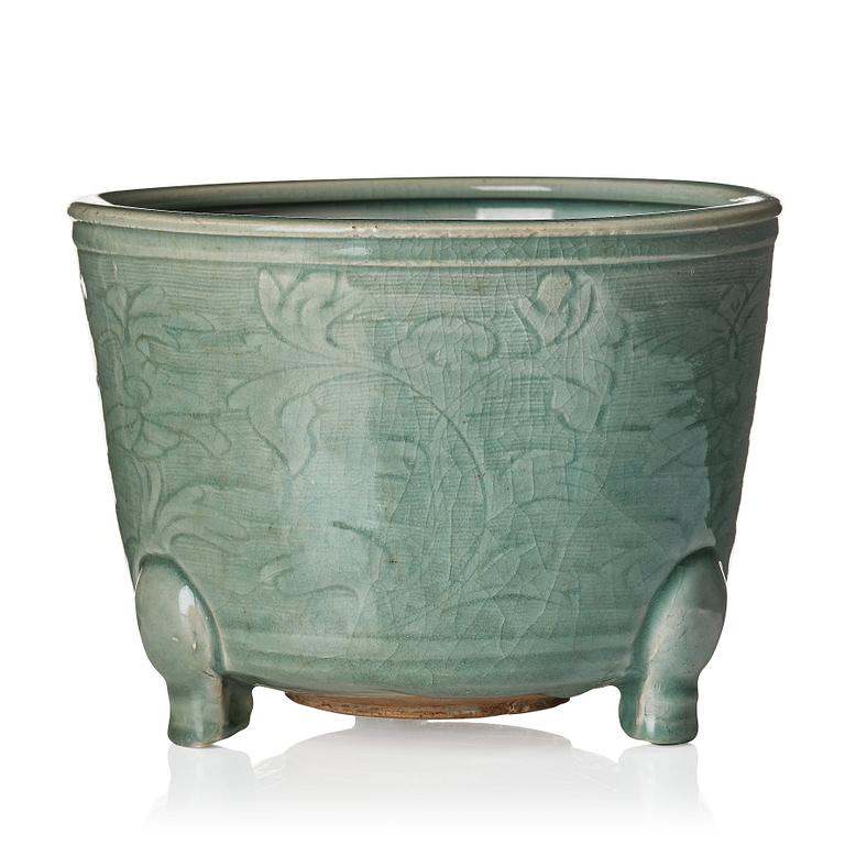 A large celadon tripod censer, Ming dynasty (1368-1644).