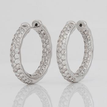 A pair of loop diamond earrings, 2.58 cts in total, according to engraving.