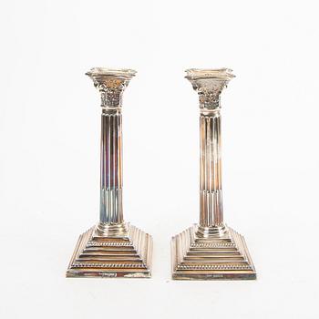 A pair of 20th century English silver candle sticks London 1965.