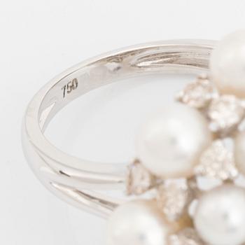 Cultured pearl and brilliant cut diamond ring.