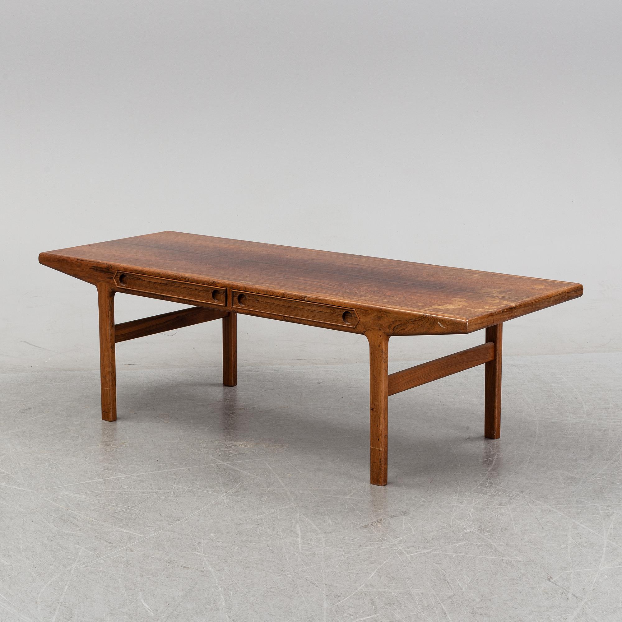 A 1950's/60's rosewood veneered coffee table.