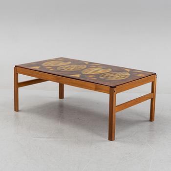 A walnut coffee table, 1960's/1970's, signed Baco.