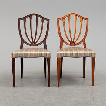 A dining table and 12 chairs, second half of the 20th century.