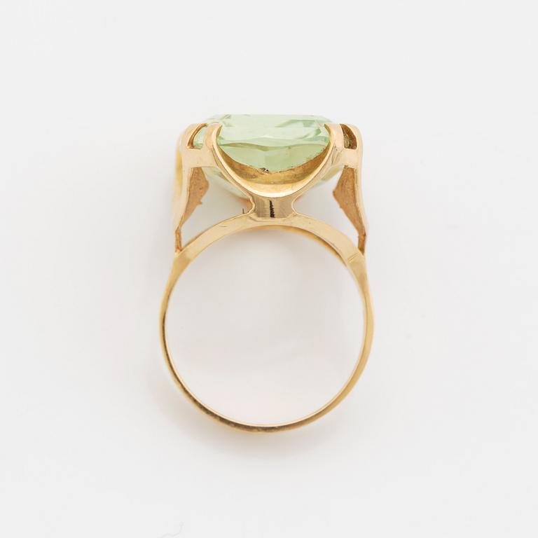 Synthetic green spinel cocktail ring.