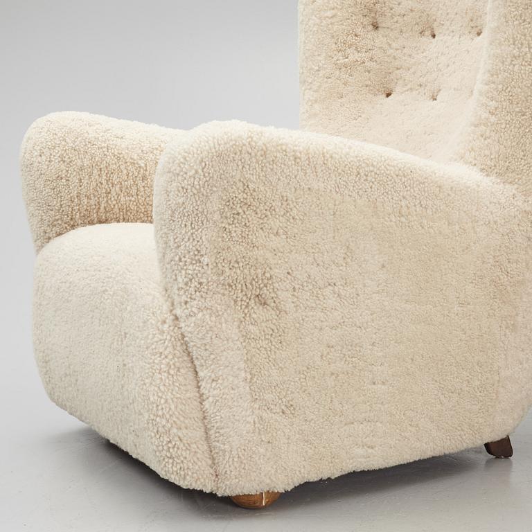 A pair of Danish Modern sheepskin armchairs, 1930's/40's.