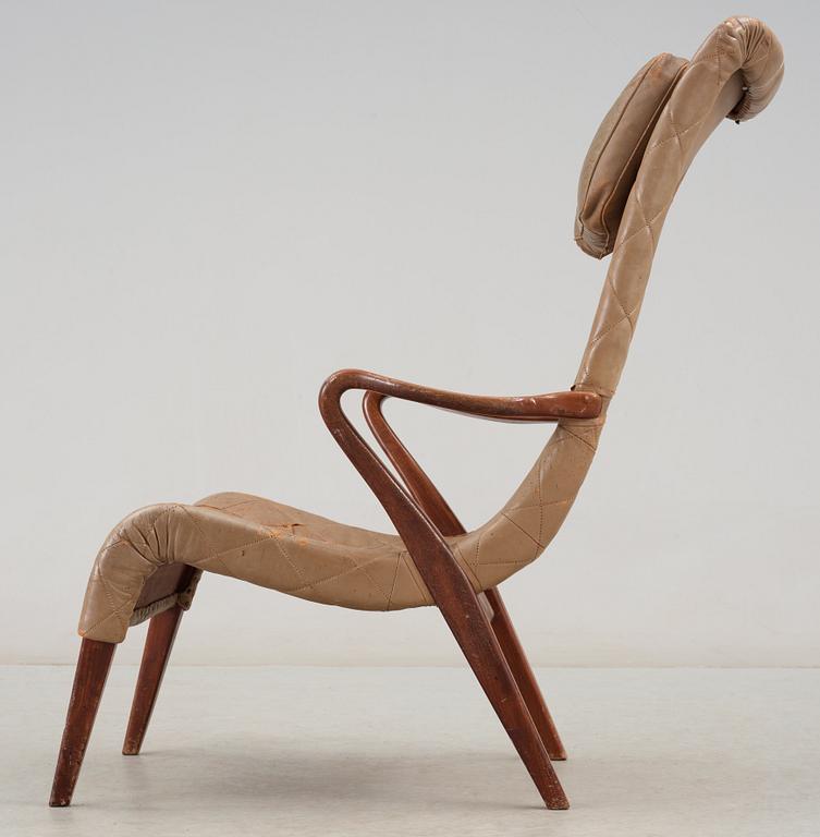 An Axel Larsson birch and leather easy chair, Bodafos, 1940's, model 1207.