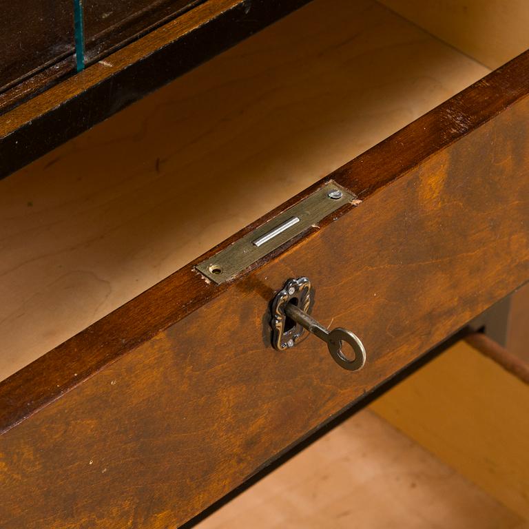 A 1930s functionalist style cabinet.