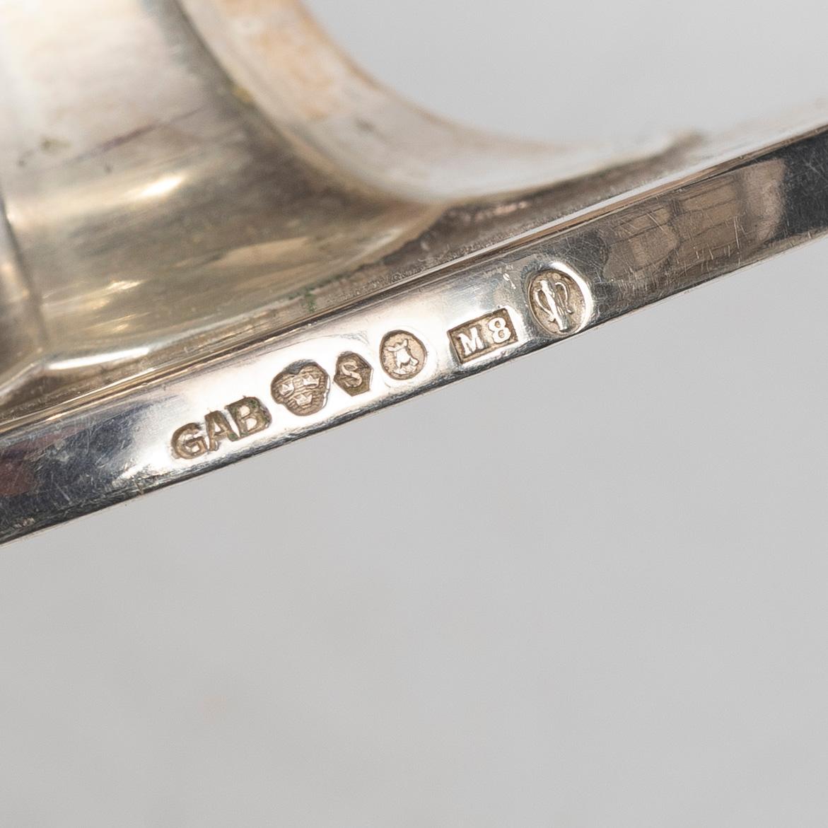 Sauceboat and four punch cups, silver, Sweden, 20th century.