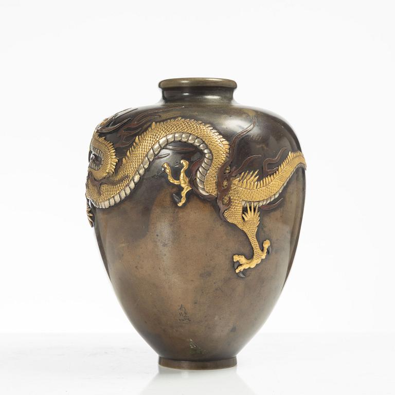 A Japanese gilt bronze and silvered dragon vase, Meiji period (1868-1912). Signed.