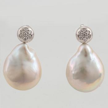 Cultured freshwater pearl and diamond earrings.