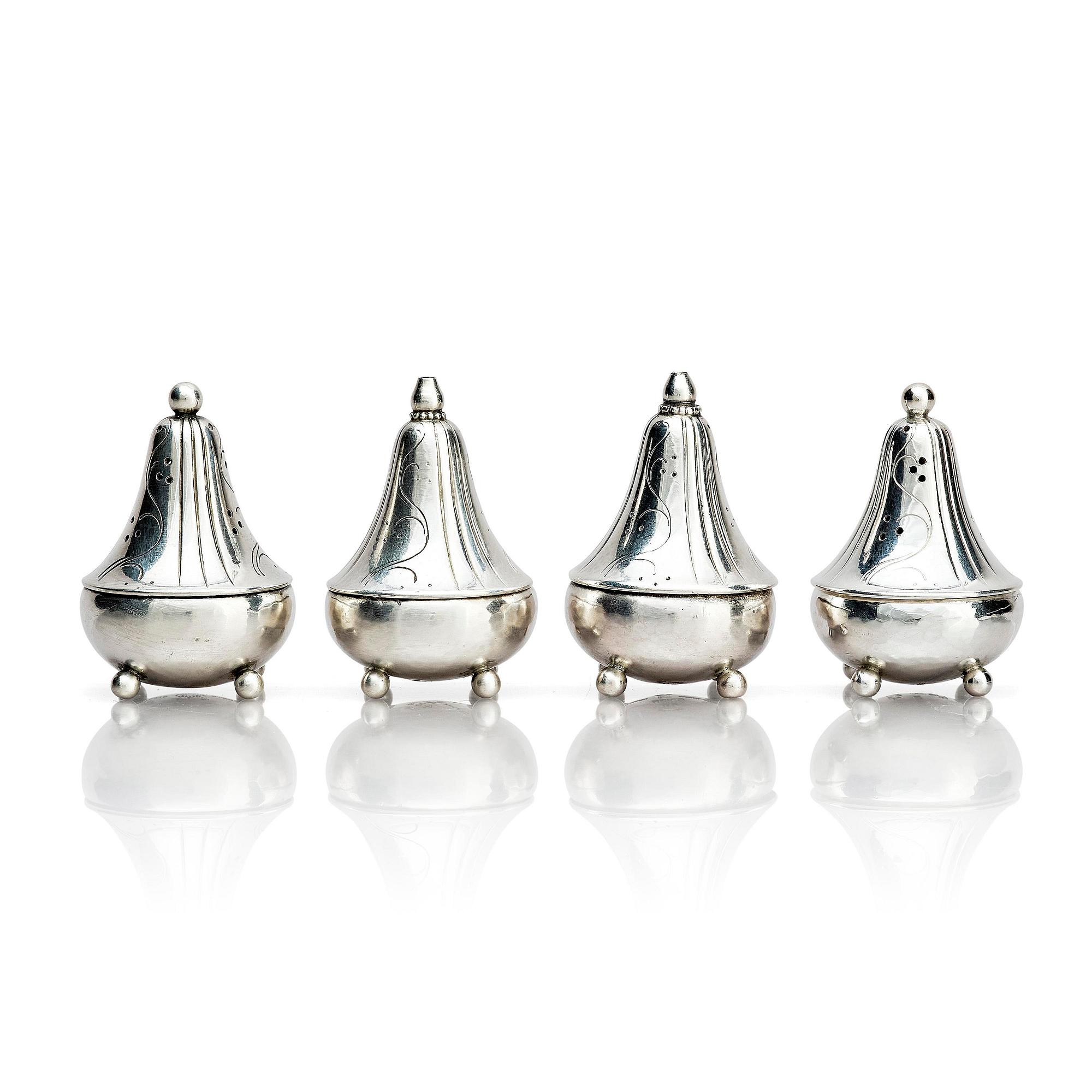 Georg Jensen, four sterling silver casters, design Harald Nilesen, Copenhagen 1933-44, one Copenhagen after 1945.