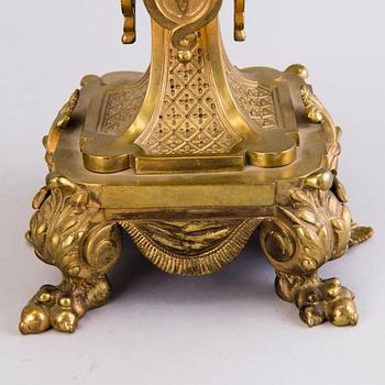A pair of bronze candelabra from the latter half of the 19th Century.