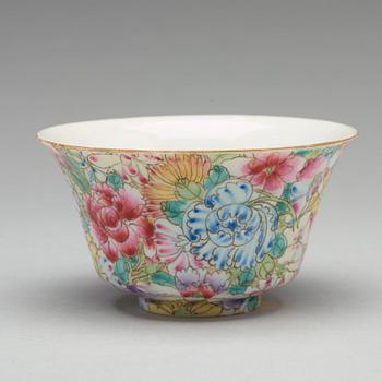 A set of six Chinese 'mille fiori' tea cups with covers and stands, and 12 small dishes, circa 1900.