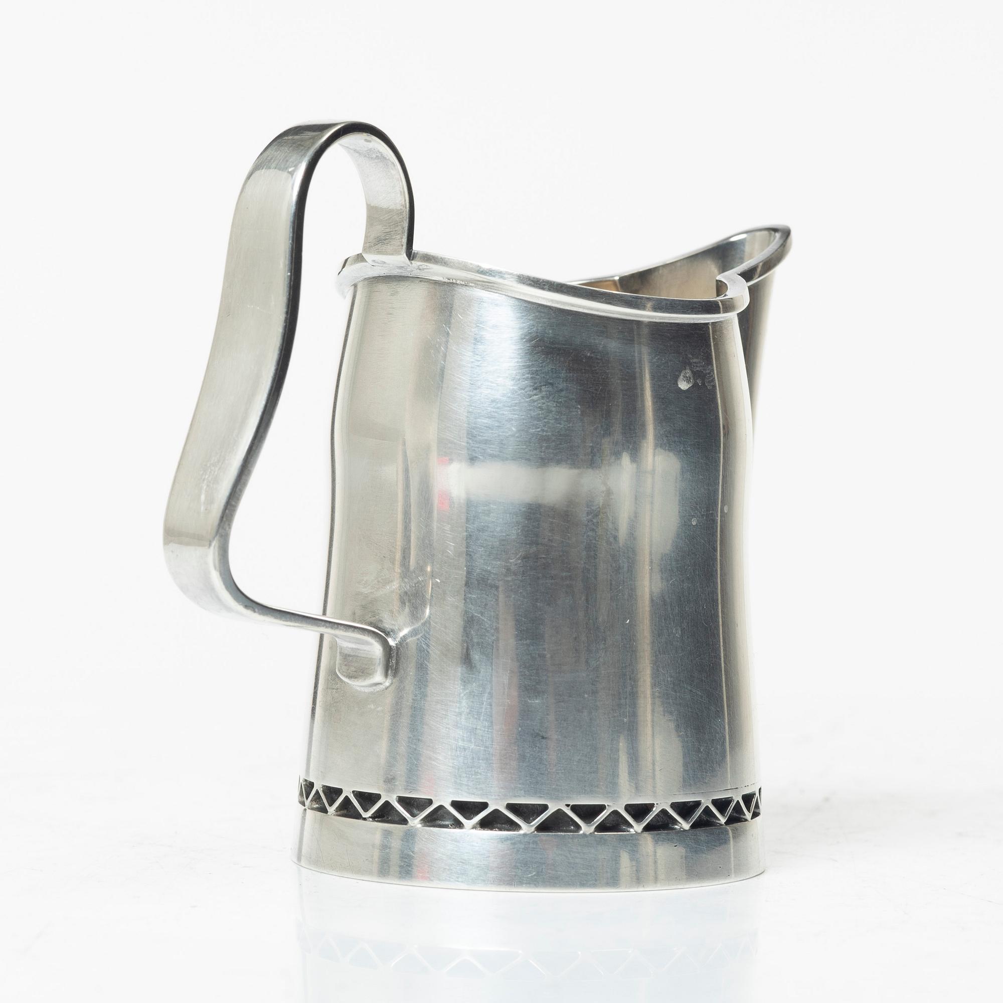 A three-piece silver coffee service by Helge Lindgren for K. Andersson, Stockholm, 1958.