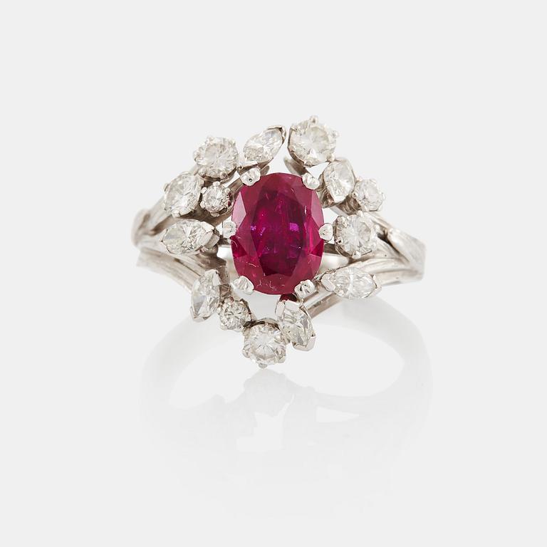 A WA Bolin ring set with a faceted pink sapphire and round brilliant- and navette-cut diamonds.