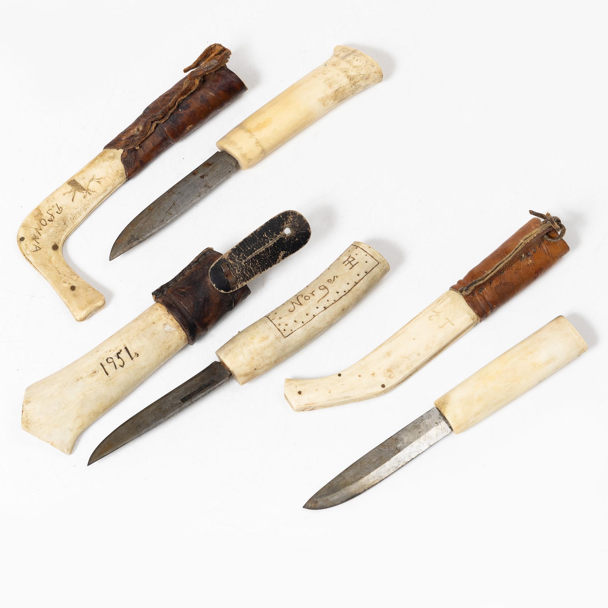 Six knives, and a cup.
