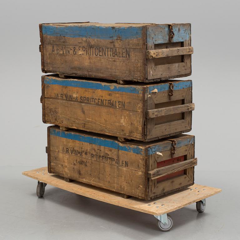 Three mid 1900s wooden boxes.