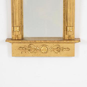 An Empire mirror, 1820.