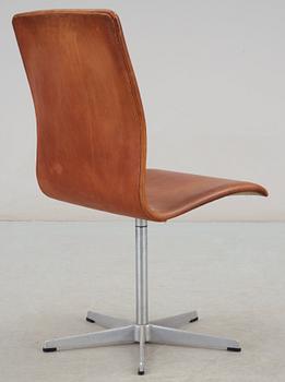 An Arne Jacobsen 'Oxford' brown leather and aluminium chair, Fritz Hansen, Denmark.