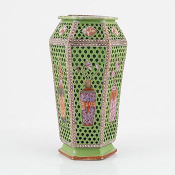 A hexagonal reticulated vase, Qing dynasty, 18th century.