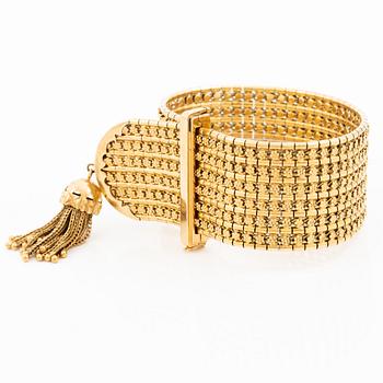 Armband 18K guld med tofs, 1900-talets andra hälft.