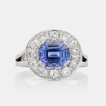 Rey Urban, A circa 3.10ct purple sapphire and diamond ring. Total carat weight circa 0.94ct. Rey Urban, 1970.