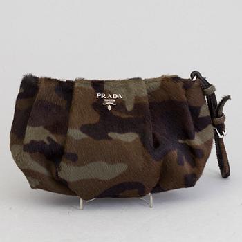 A ponyhair clutch by Prada.