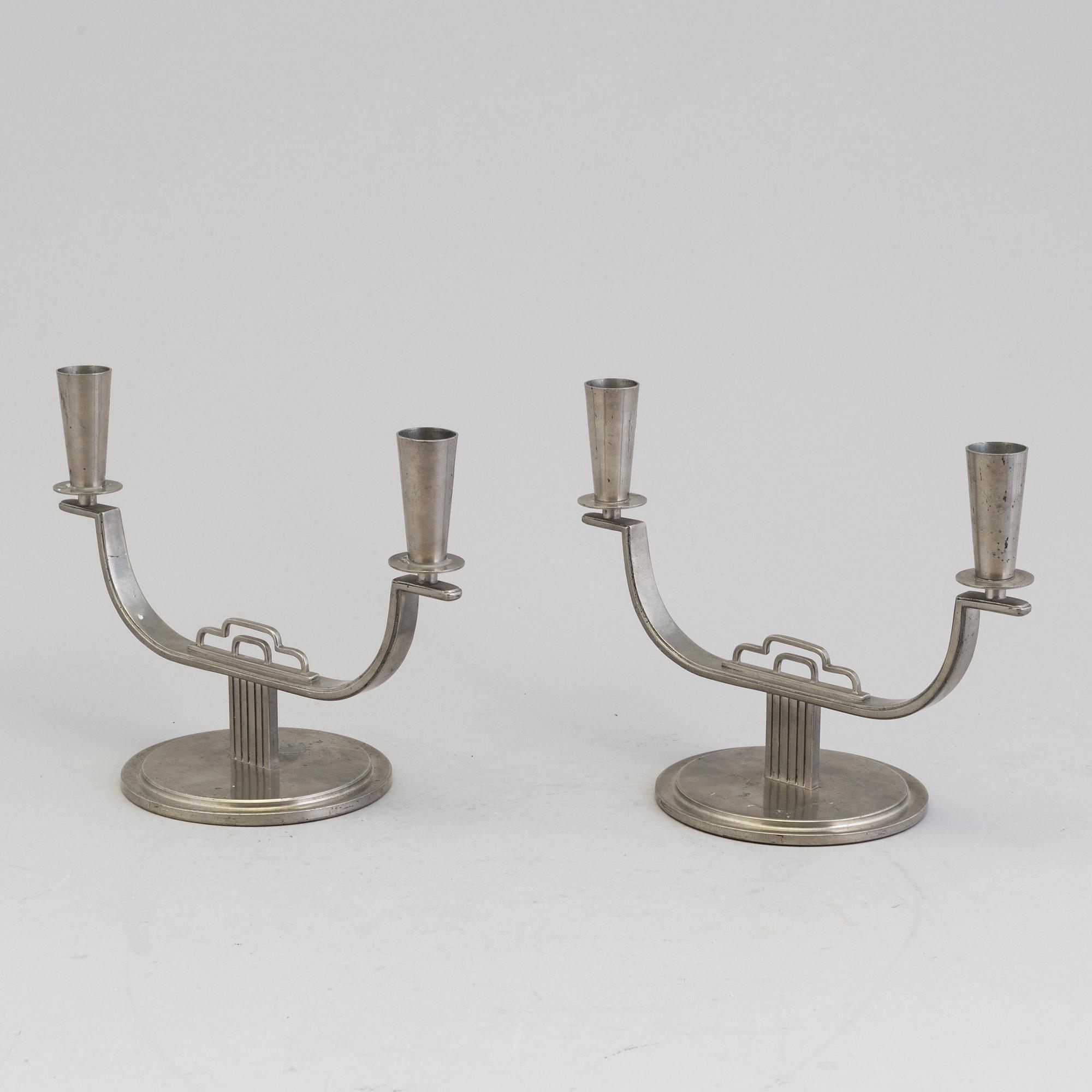 A pair of pewter candelabra by Carl Einar Borgström, Ystad Metall, marked CEB.