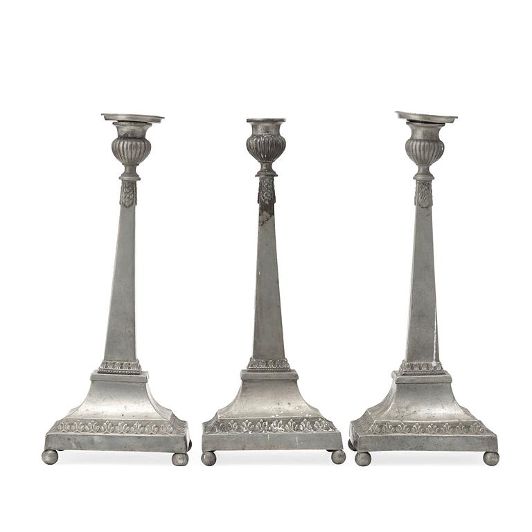 A sert of three late Gustavian pewter candlesticks by M Artedius 1800.