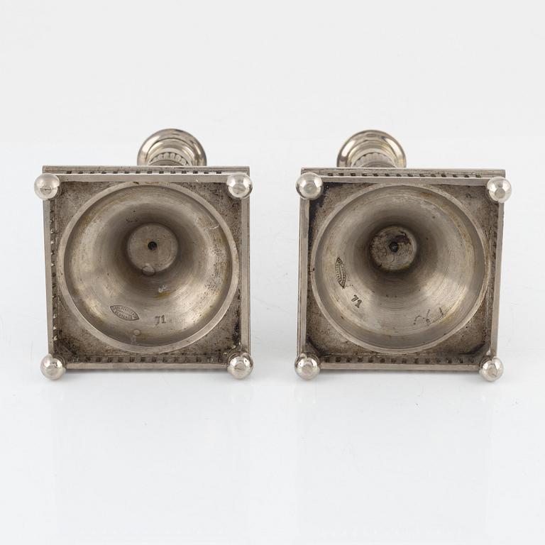 Carl Keijser & Co, a pair of Gustavian style candlesticks, first half of the 20th Century.