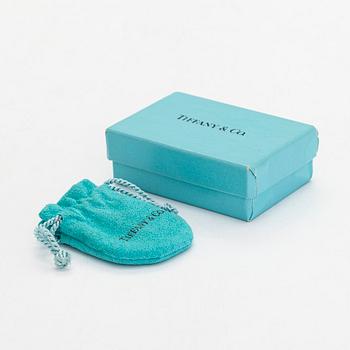 Tiffany & Co, Paloma Picasso, a pair of 18K gold 'Loving Heart' earrings.