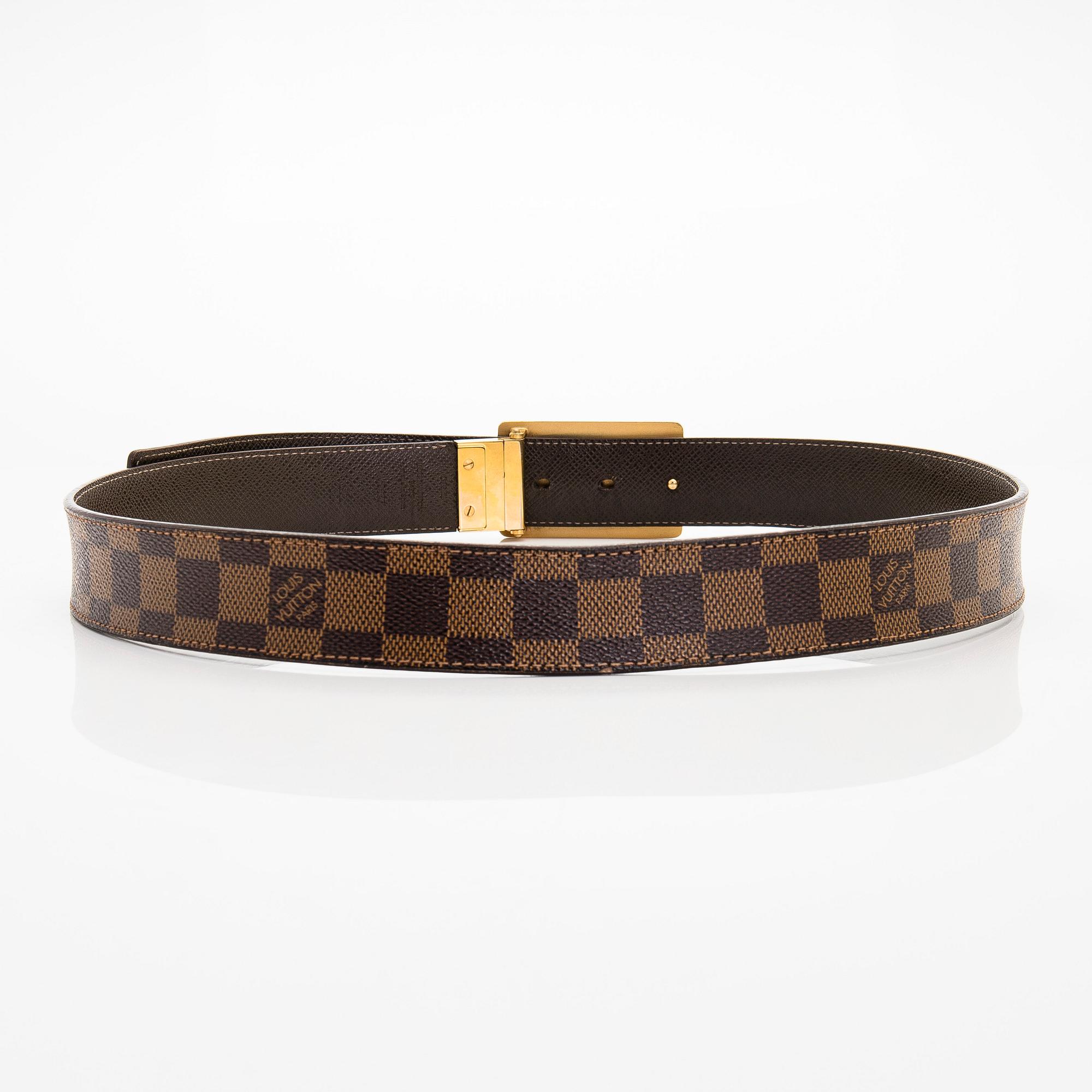 Louis Vuitton, a 'Zippy Coin Purse' wallet and an 'Inventeur' belt.